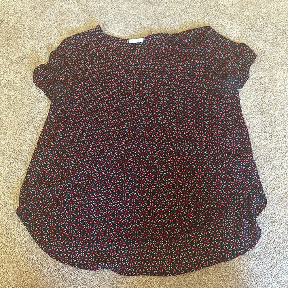Short sleeve large blouse. Black with pink and orange flowers.